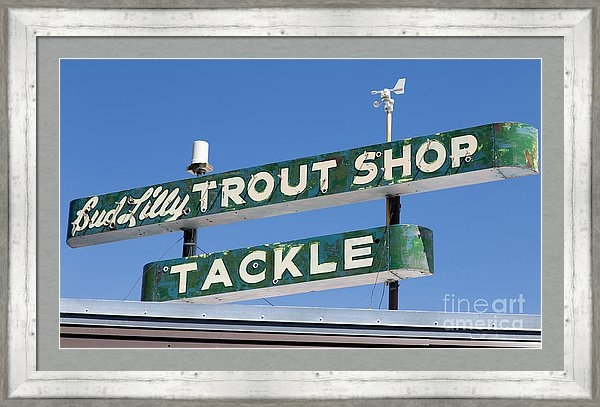 Vintage trout shop sign in West Yellowstone, Montana.