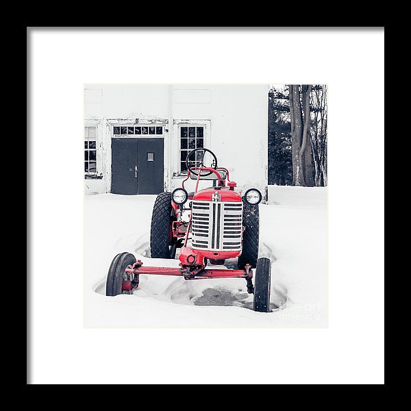 Vintage International Harvester Antique Tractor In The Snow