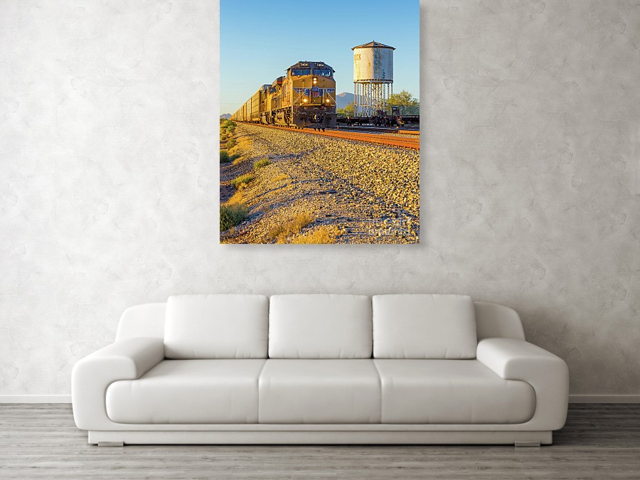 not appear in the final print. .... A Union Pacific train pulling a line of freight cars by the water tower in Red Rock, Arizona between Phoenix and Tuscon. Fine art photography by Edward M. Fielding.