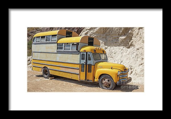 Triple decker customized vintage school bus.